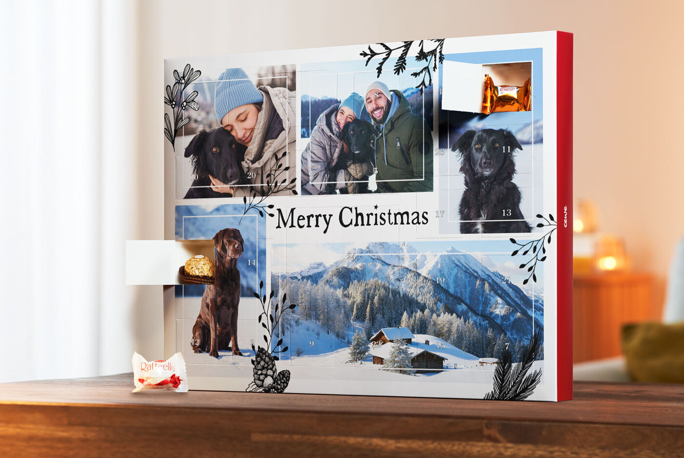 Un meraviglioso libro fotografico CEWE con motivi natalizi e immagini di un cane.